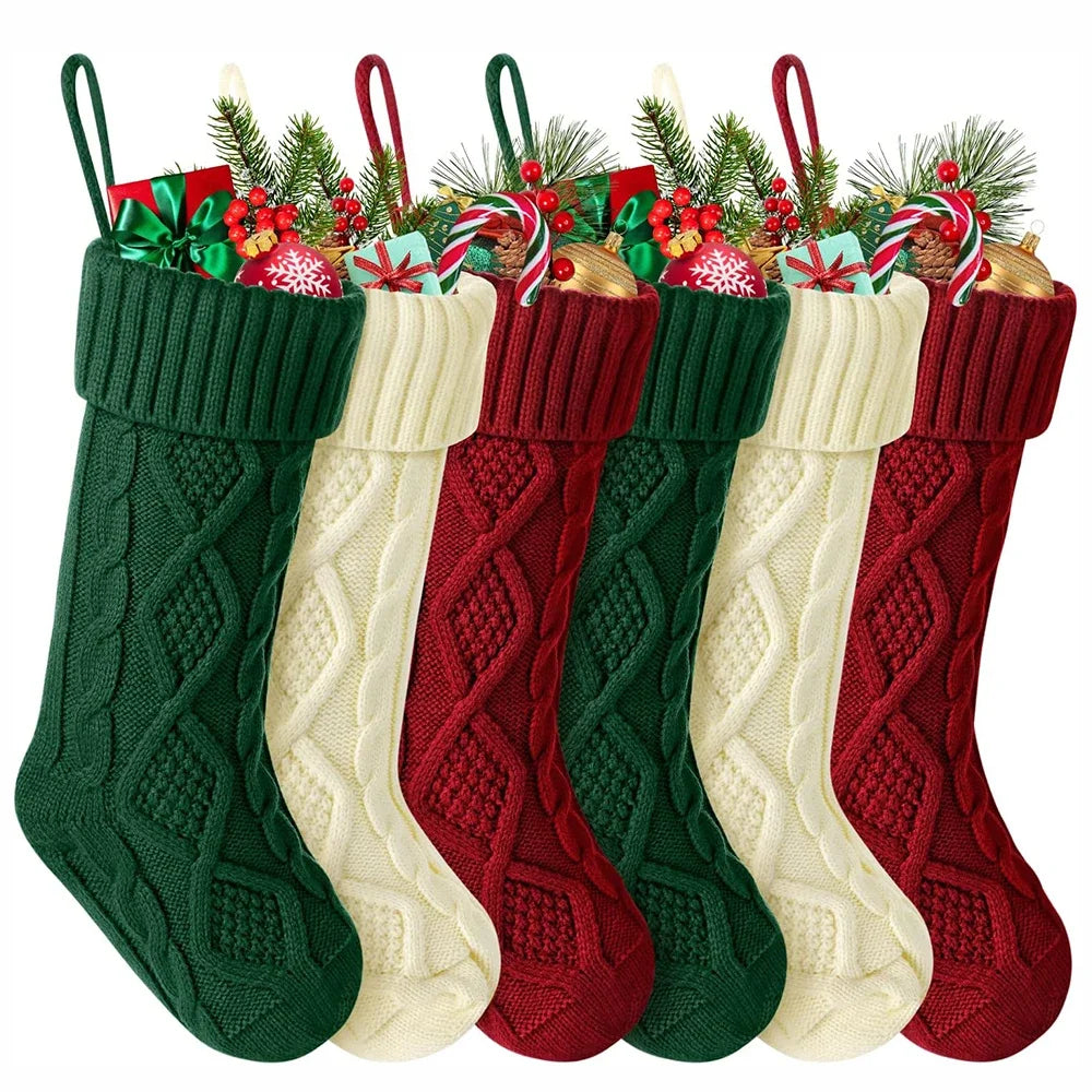 Knit wool christmas stockings in a group 